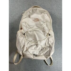 cream and rose gold north face backpack The Borealis for Women while side bungee cords allow for compression Rose Gold North Face Backpack